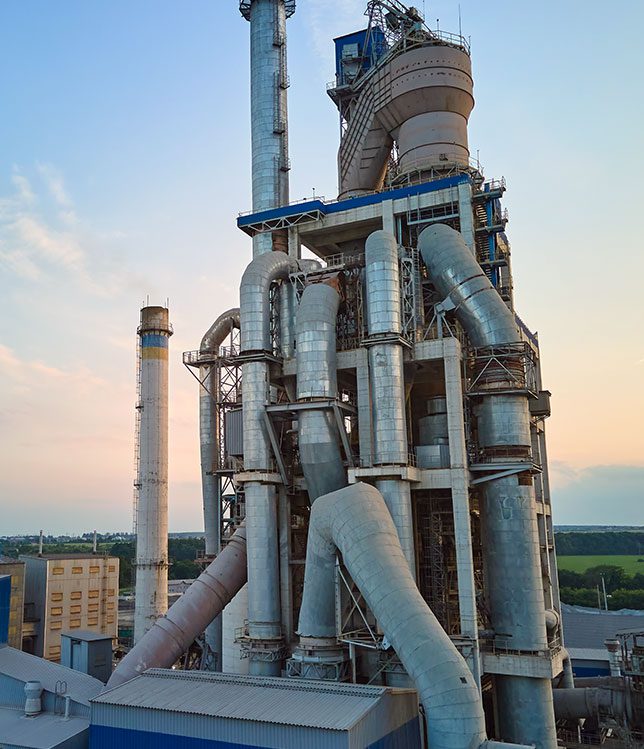 Cement kiln refractory installation improving thermal efficiency and extending service life in a rotary kiln system.