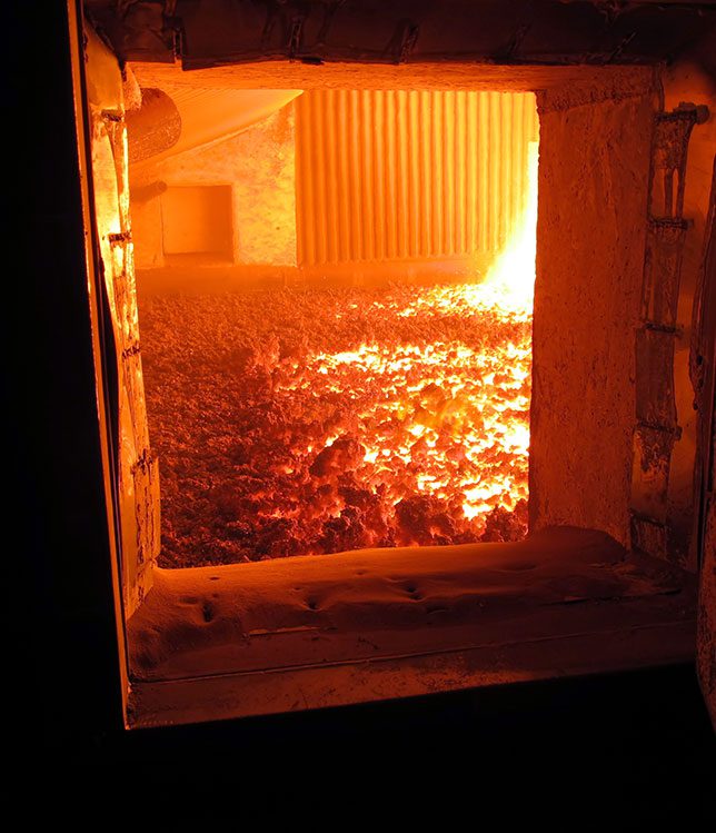 Incineration chamber with refractory lining providing superior corrosion resistance and optimized heat containment.